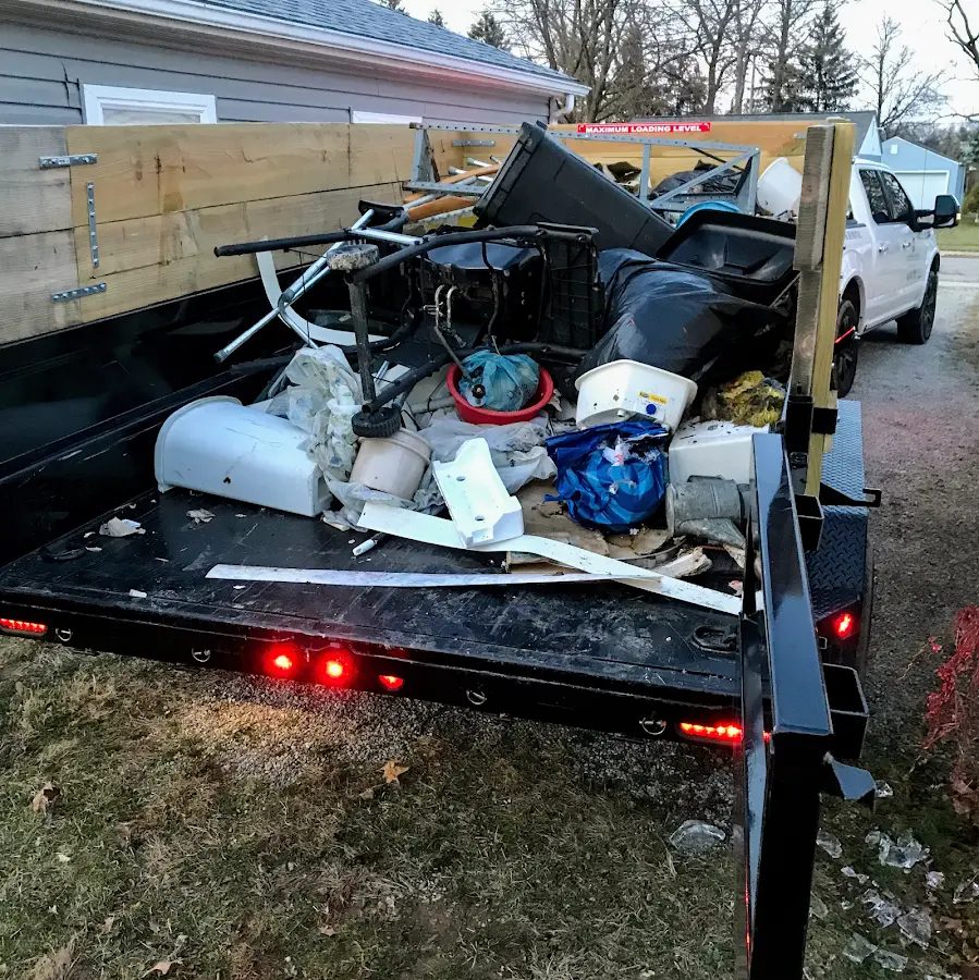Roll-off dumpster delivered to a residential driveway in Keene