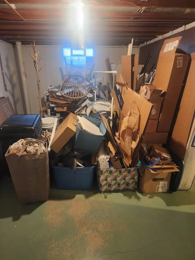 Roll-off dumpster container at job site for 20 Yard Dumpster Rental in Keene